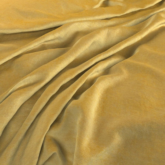 Draped Aurea Chenille Ochre fabric showcasing its smooth, washable texture and rich ochre color, perfect for elegant interior designs.