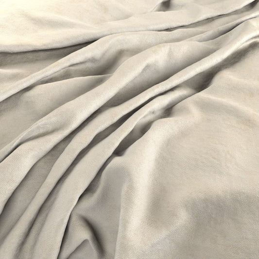 Draped Aurea Chenille Oyster fabric showcasing its soft, washable texture and elegant beige tone for creative arts and crafts.
