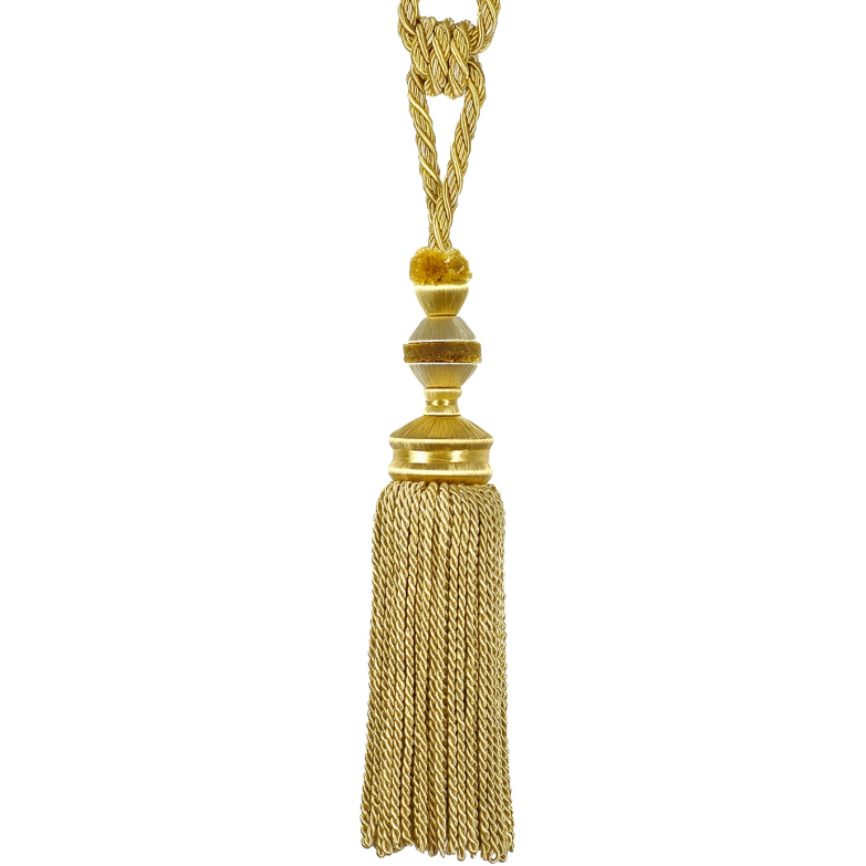 Gold tassel with decorative elements on a white background