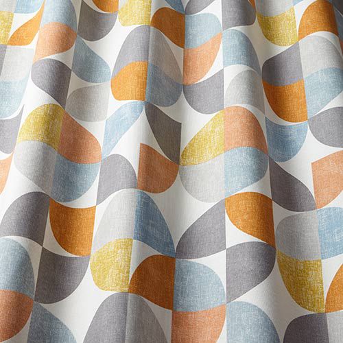 Close-up of Modern Curve Tangerine fabric showcasing its vibrant geometric design in orange, blue, and grey, perfect for home décor projects.