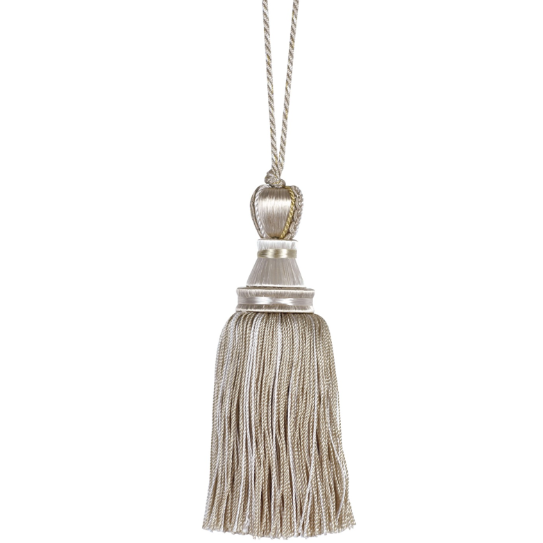 Decorative key tassel with metallic finish on a white background