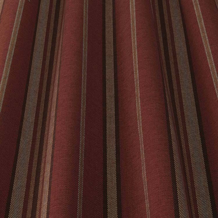 Close-up of Glenmore Stripe Fabric Sangria showcasing its textured weave and durable, stain-resistant design for upholstery projects.