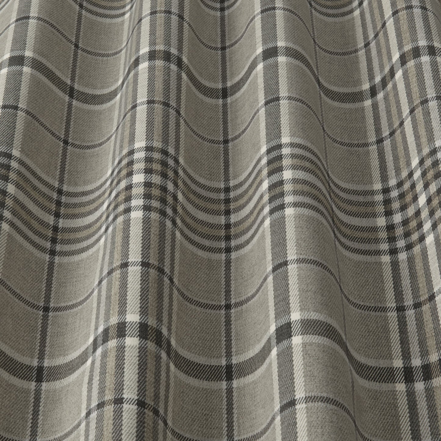 Close-up of Glenmore Contract Check Pebble tartan fabric showcasing its stain-resistant texture and timeless check design.