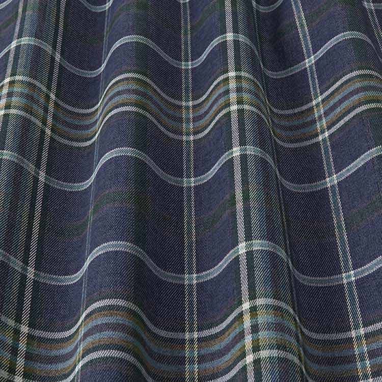 Glenmore Contract Check Oxford Blue tartan fabric draped to showcase its stain-resistant texture and timeless plaid design. Perfect for upholstery.