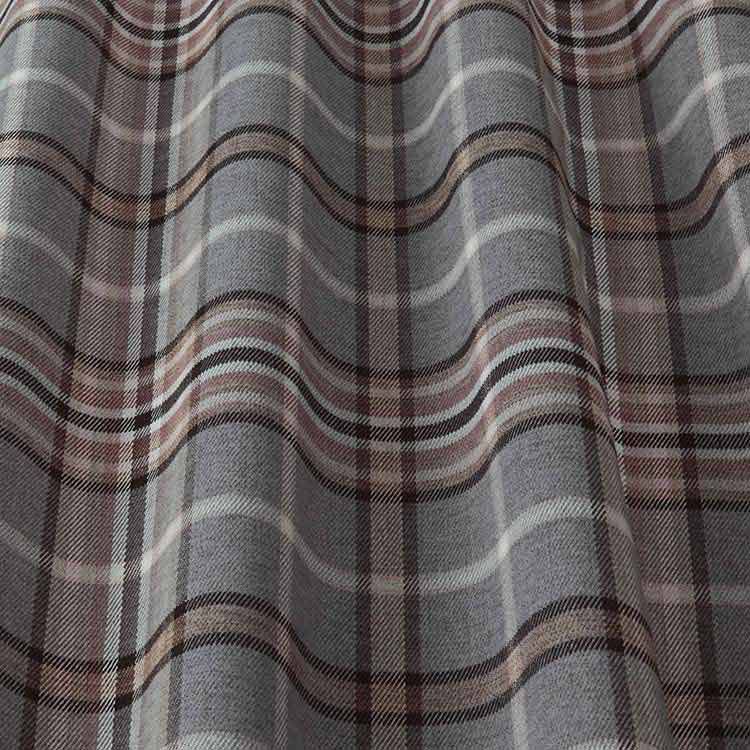 Close-up of Glenmore Contract Check Smoke tartan fabric showcasing its textured weave and elegant gray, red, and white check pattern.