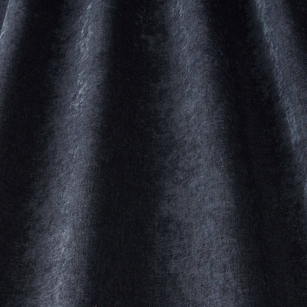 Luxurious Grosvenor Contract Chenille Indigo fabric draped to show soft sheen and rich indigo tone, perfect for contract upholstery use.