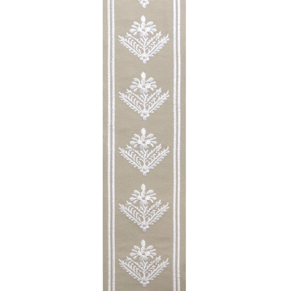 Close-up of Laura Ashley Mr Jones Border Dove trim with geometric floral fern patterns in white embroidery, ideal for home décor accents.