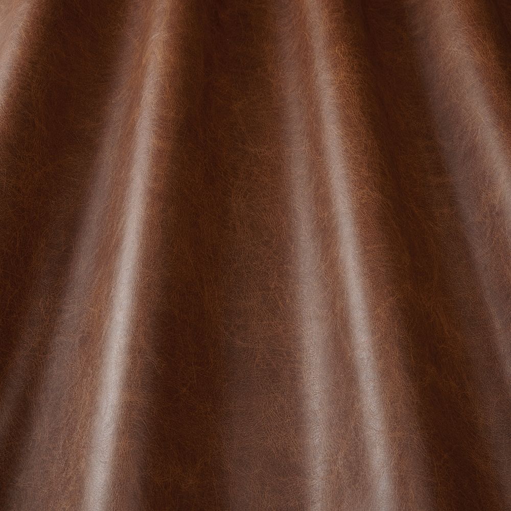 Pommel Tawny waterproof vinyl fabric with a smooth draped appearance, showcasing its durable and stain-resistant qualities.