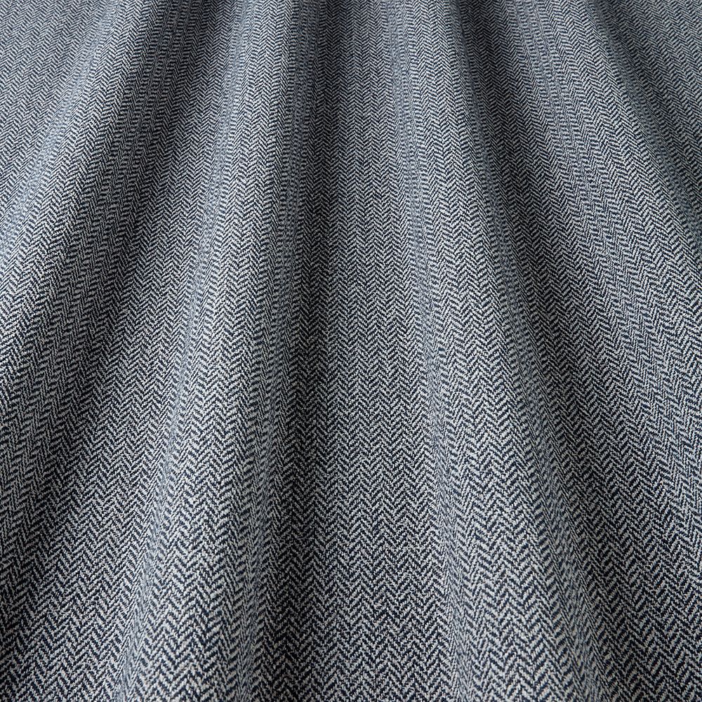 Close-up of gray fabric with a subtle pattern