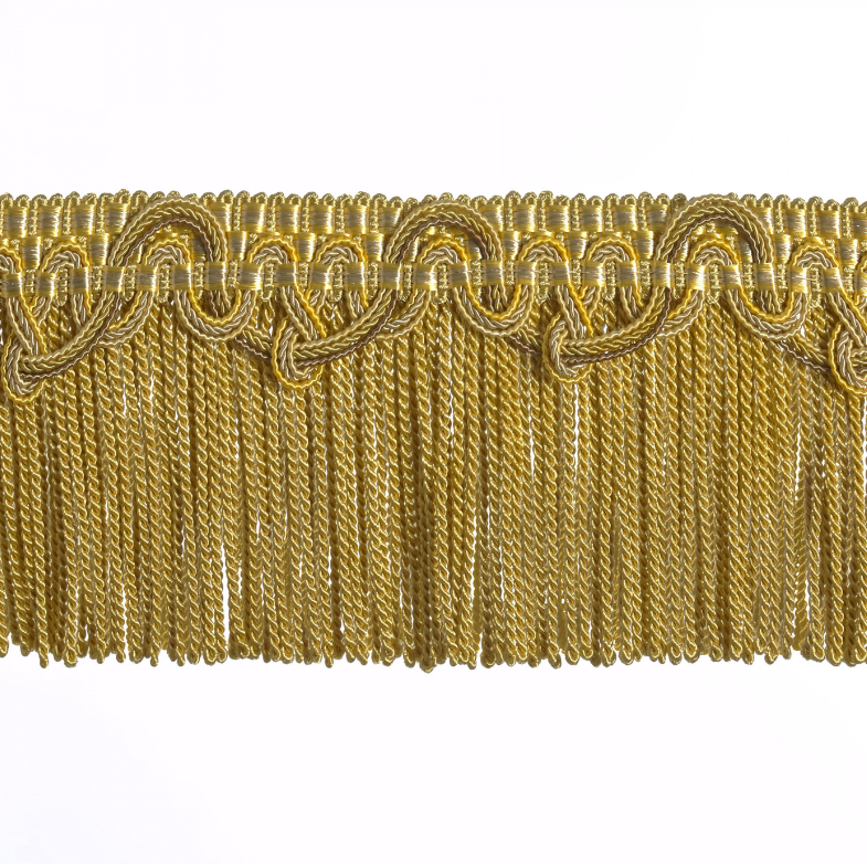 Gold fringe trim on a white background