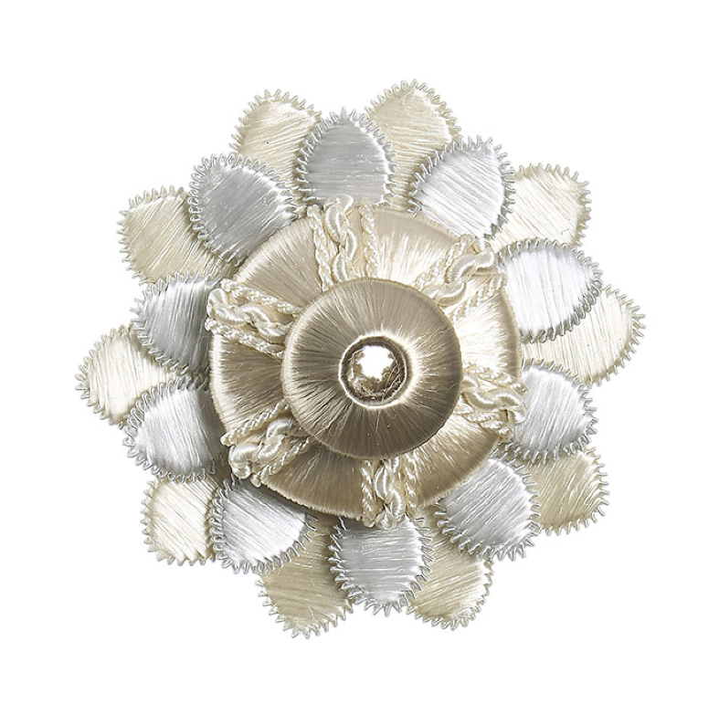 Decorative rosette with gold and silver petals on a white background