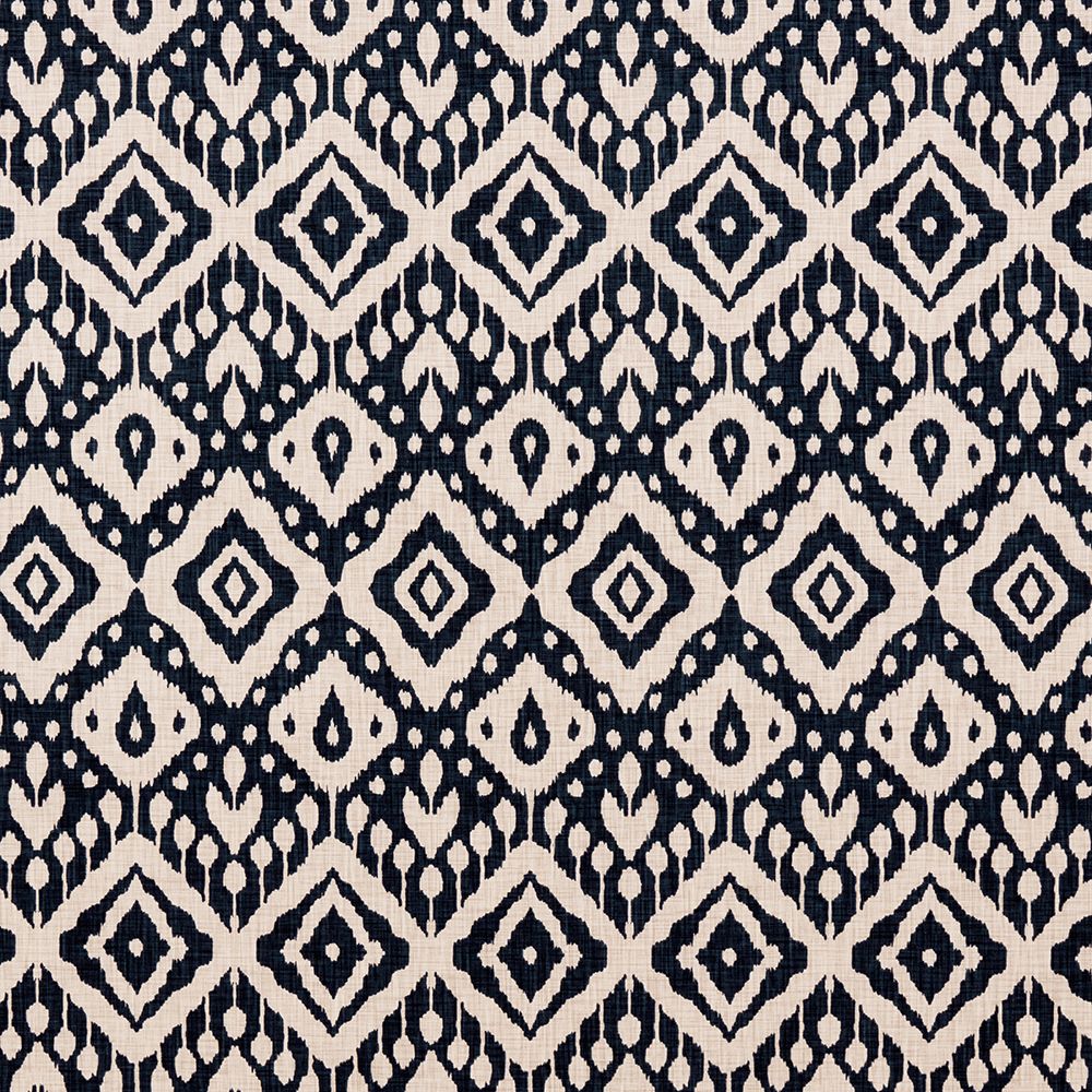 Close-up of Safi Moroccan Ikat fabric showcasing intricate midnight blue geometric patterns, perfect for upholstery and African-style décor.