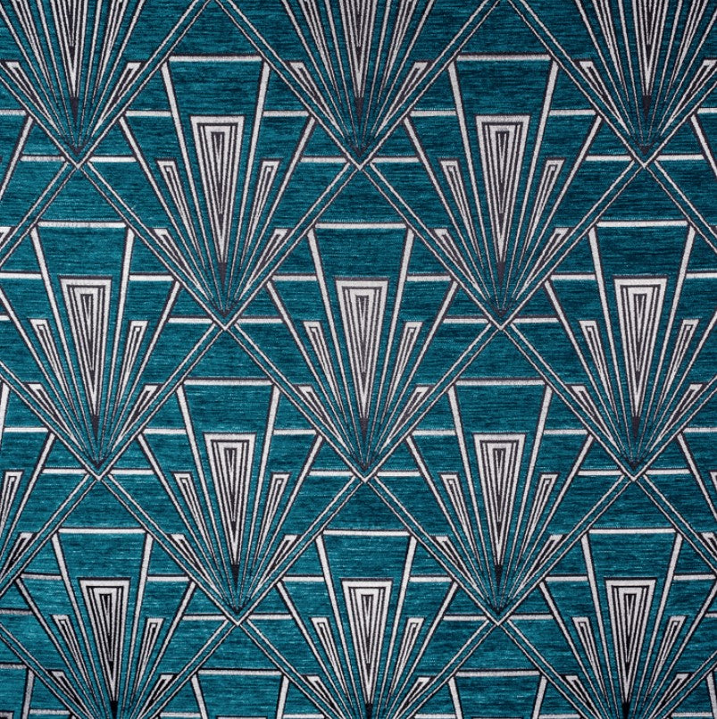 Tempo Plaza fabric in blue and silver with an Art Deco geometric pattern, featuring thick chenille texture for upholstery and curtains.