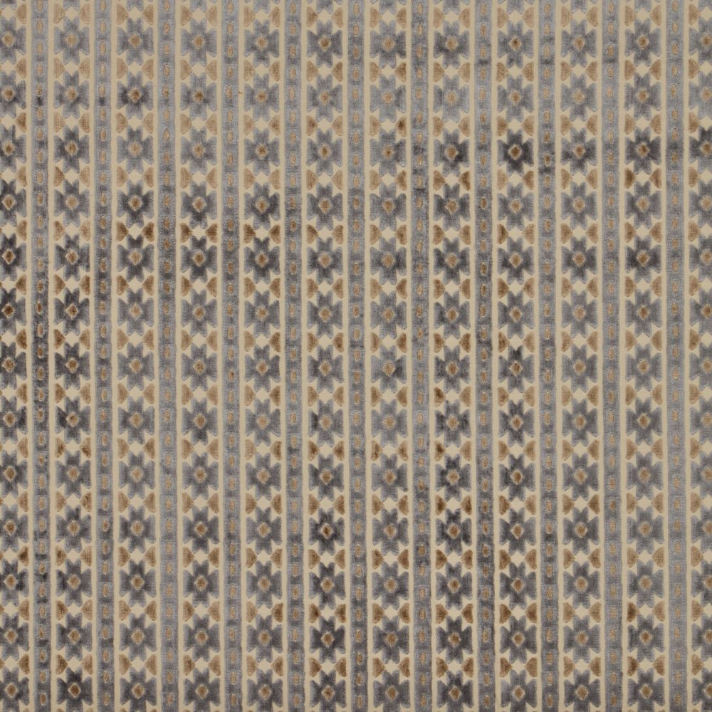 Close-up of Zanzibar Velvet Glacier fabric showcasing intricate geometric designs in muted blue and beige, perfect for upholstery and creative projects.