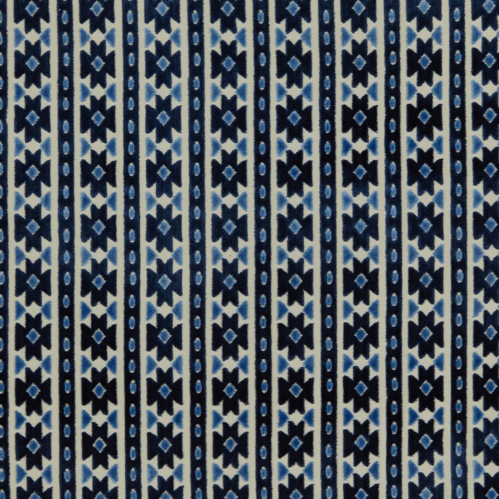 Close-up of Zanzibar Velvet Sapphire fabric showcasing intricate geometric designs in deep blue, perfect for upholstery and creative crafts.