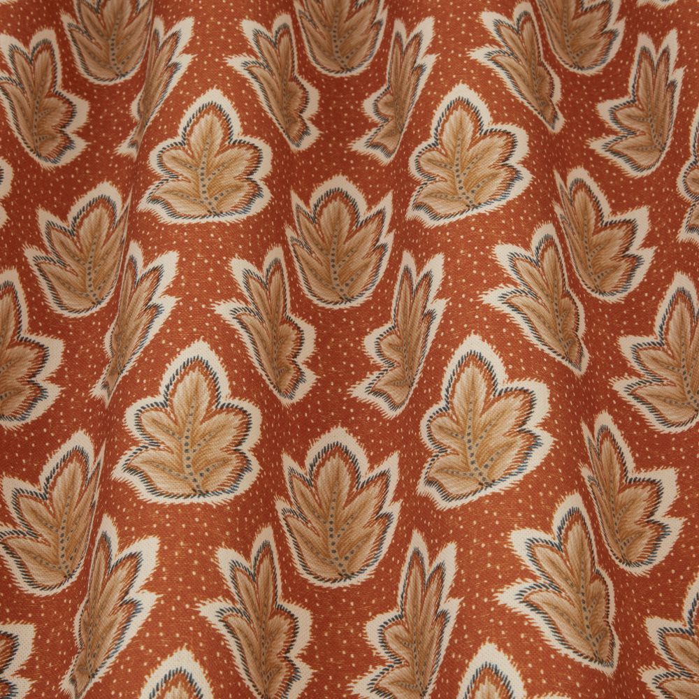 Close-up of Ziro Leaf Amber fabric showcasing detailed Indian leaf patterns in warm amber hues, perfect for home furnishings and décor.