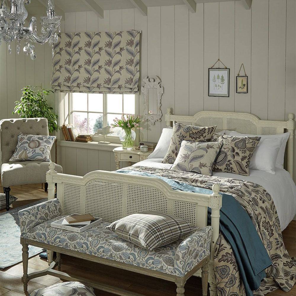 Bedroom décor featuring Climbing Fruitlet Dove fabric in curtains, cushions, and bedding, creating a cohesive arts and crafts-inspired aesthetic.