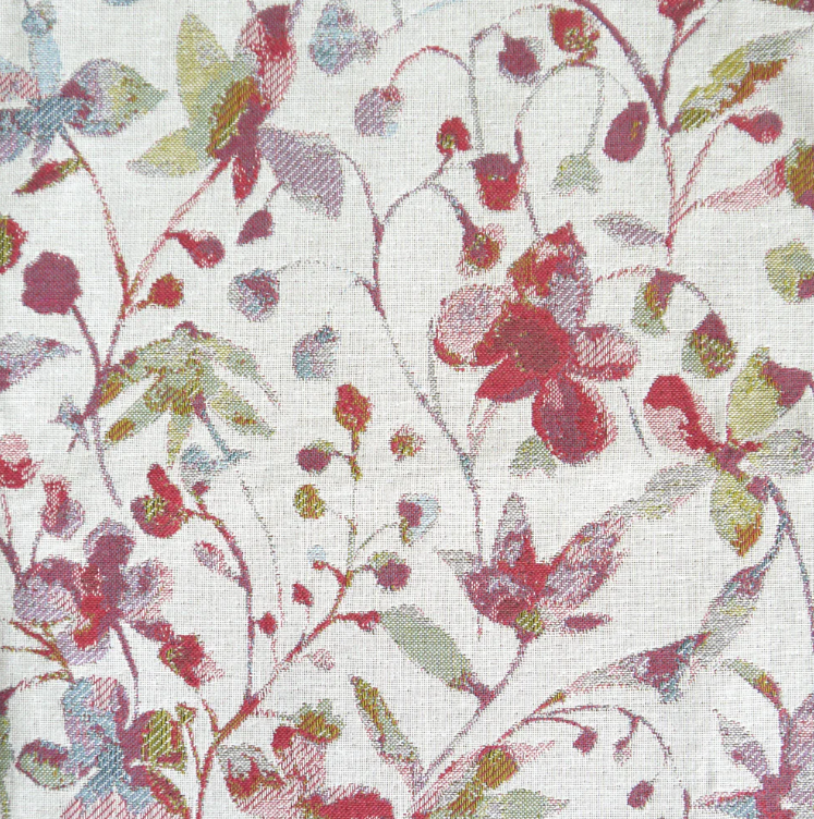 Amble Floral Jacquard Coral fabric featuring an intricate floral pattern in coral, green, and beige tones, ideal for interior design projects.