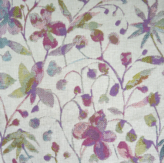 Amble Floral Jacquard Lilac fabric featuring an intricate woven floral pattern in lilac, green, and pink tones. Ideal for interior decor projects.
