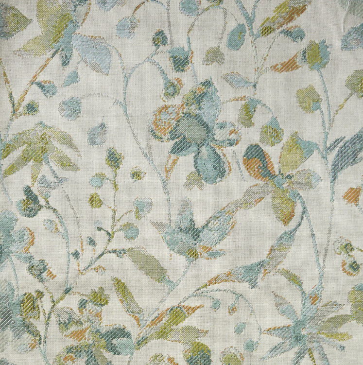Amble Floral Jacquard Sky fabric showcasing a detailed floral pattern in soft blue and green tones on a textured cotton blend surface.