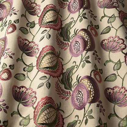 Arbor Vine Thistle fabric featuring intricate arts and crafts style embroidery with purple and green floral patterns on a neutral background, ideal for curtains.