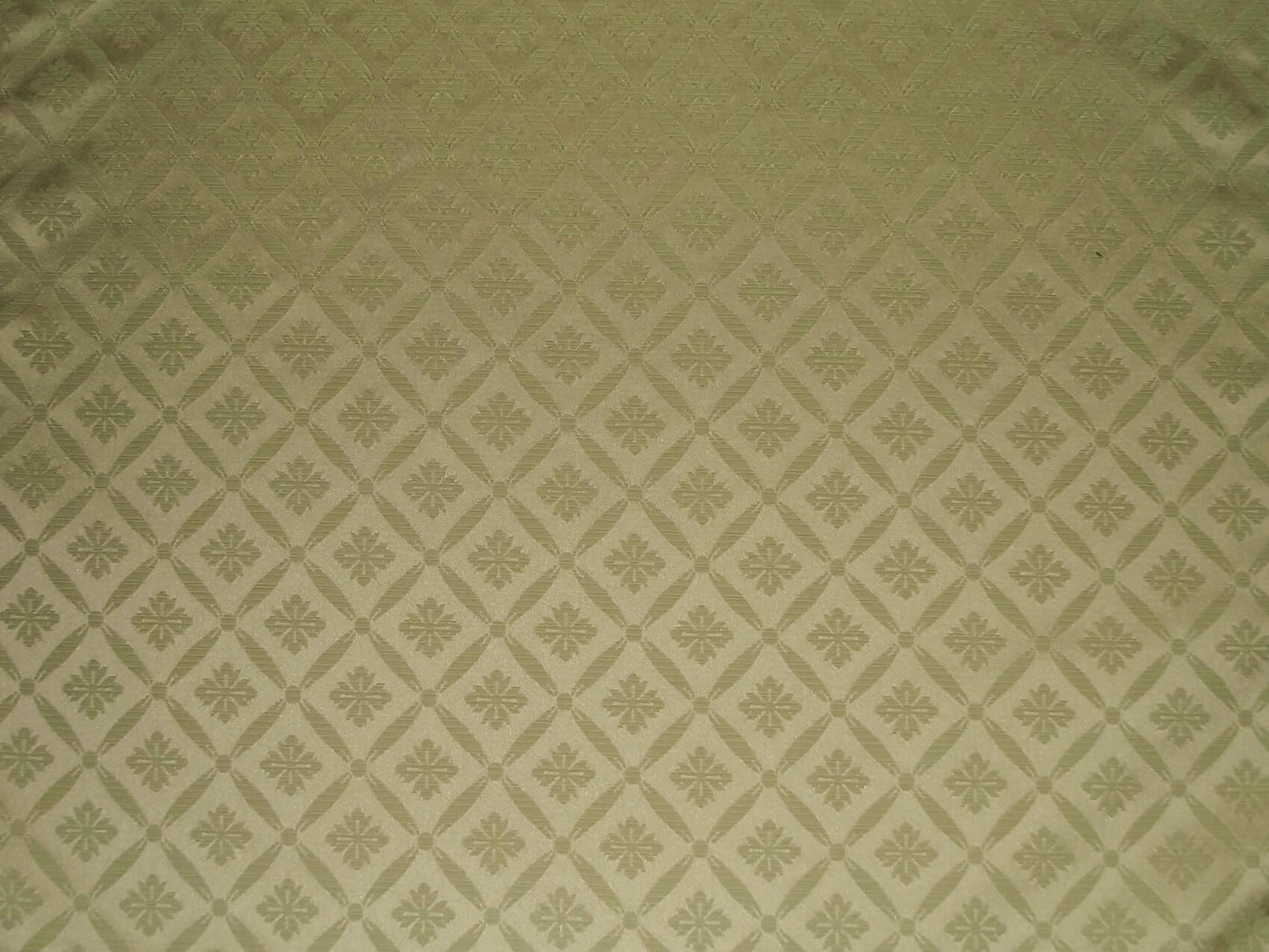 Blenheim Lattice Fabric Sage with a classic damask trellis pattern in gold tones, ideal for flame-retardant upholstery and curtains.