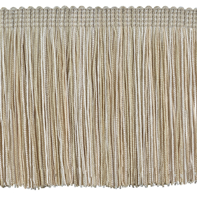 Close-up of beige fringe on a white background