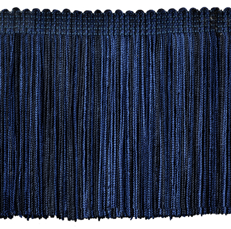 Close-up of blue fringe fabric on a white background
