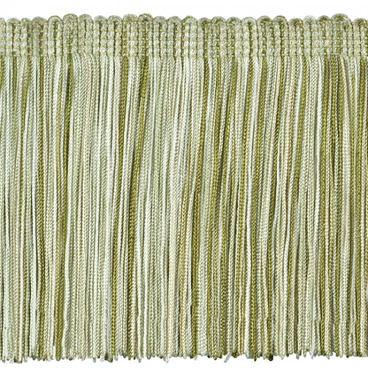 Close-up of green fringe fabric border on a white background
