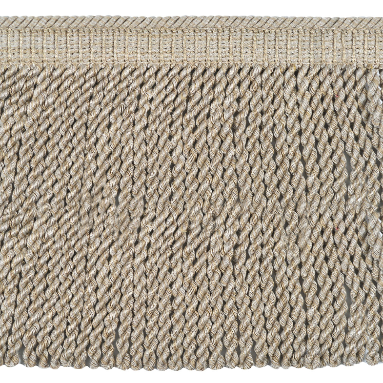 Close-up of a textured bullion fringe in pale stone.