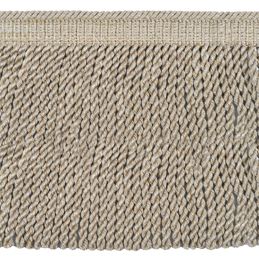 Close-up of a textured bullion fringe in pale stone.