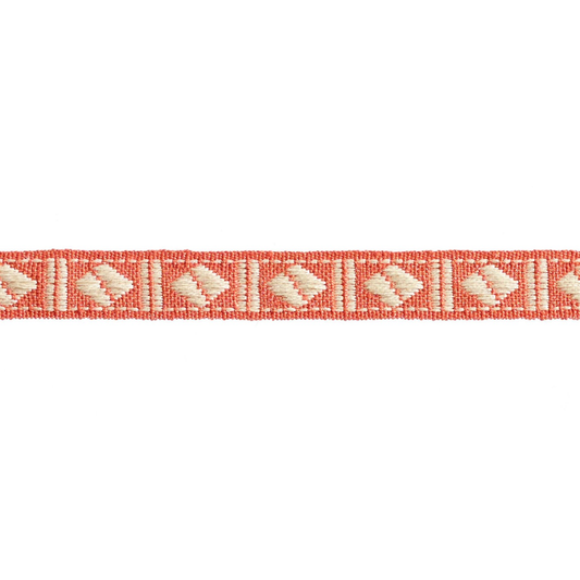 Red and white patterned braid trim on a white background