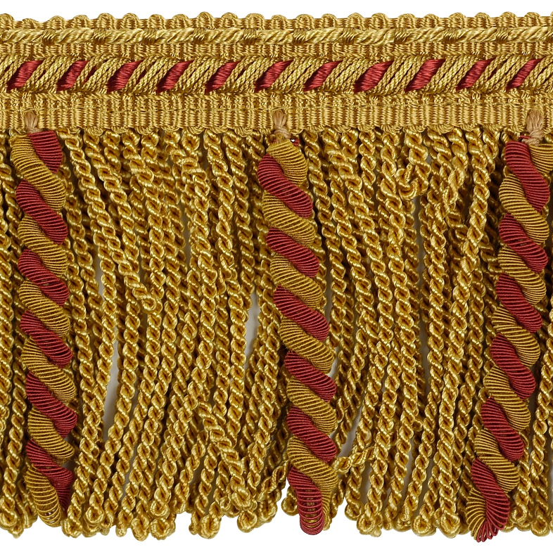 Close-up of gold and red decorative fringe trim.