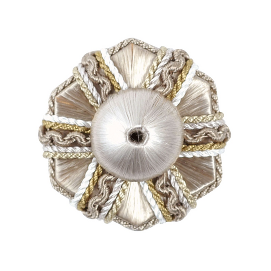 Decorative rosette with intricate grey and silver design on a white background