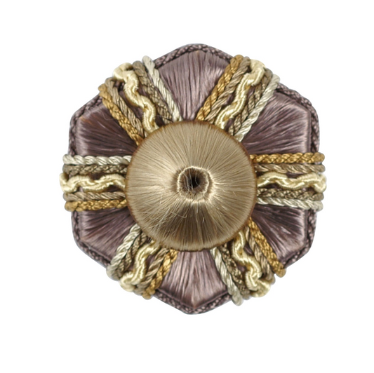 Decorative rosette with gold and purple design on a white background