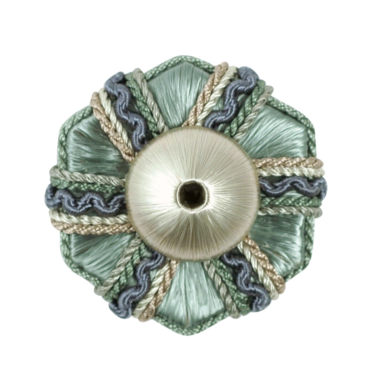 Decorative rosette with intricate design on a white background