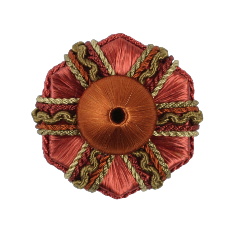 Decorative rosette with red and gold colours on a white background