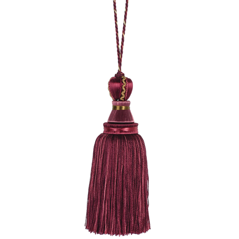 Mulberry key tassel with a gold accent on a white background