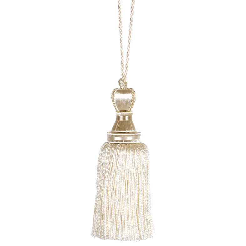 Decorative key tassel with a metallic top on a white background
