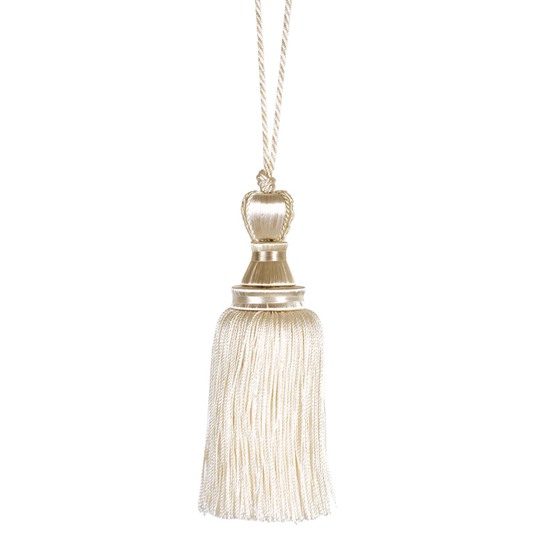 Decorative key tassel with a metallic top on a white background