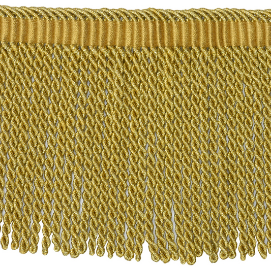 Gold fringe fabric trim on a white background