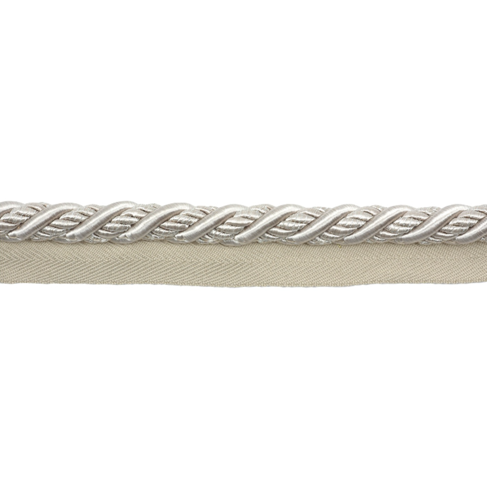 Silver braided trim on a beige fabric background