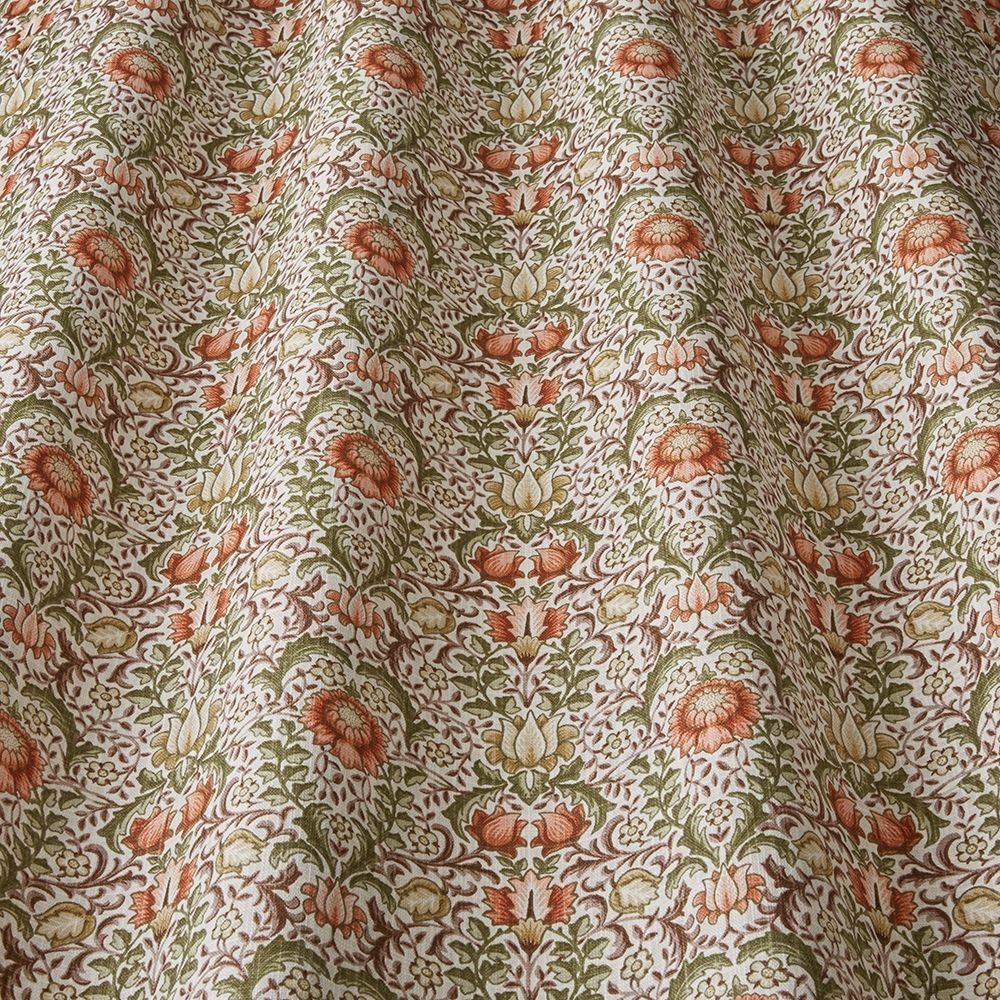 Close-up of Garnett Henna fabric showcasing its detailed floral design and soft texture, perfect for home décor and creative arts applications.