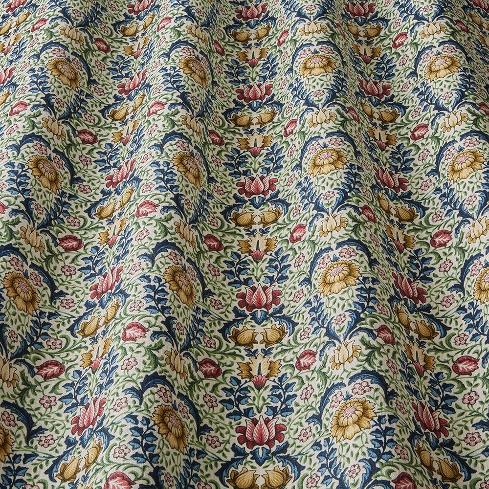 Close-up of Garnett Indigo fabric showcasing its detailed floral design and soft texture, perfect for arts and crafts or home décor projects.