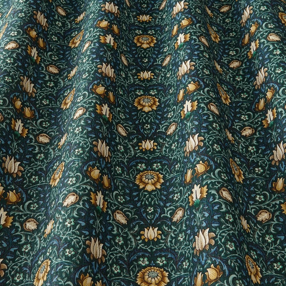 Close-up of Garnett Midnight fabric showcasing its elegant floral design in green and gold, perfect for arts and crafts, curtains, and upholstery.