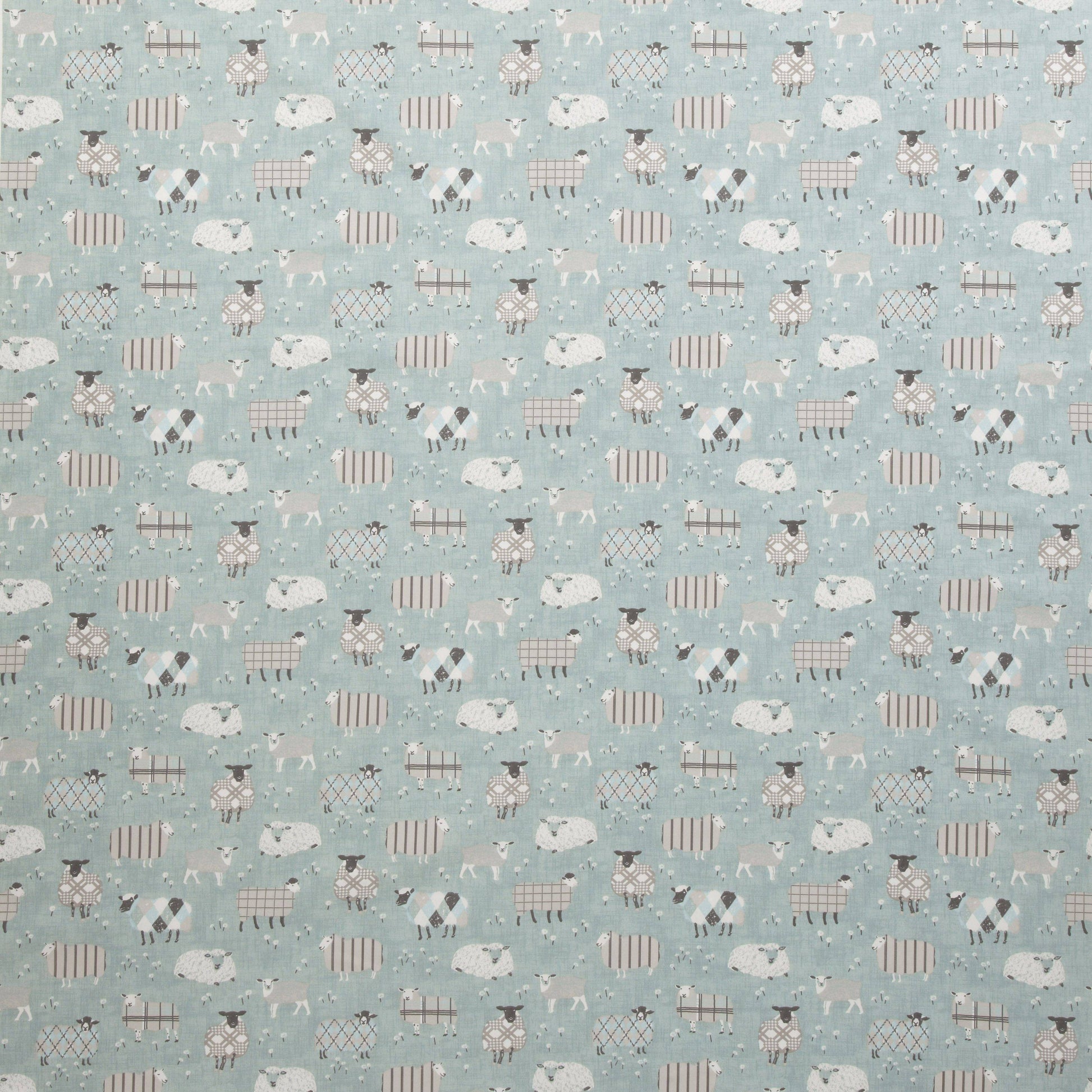Grazing Pastures Duck Egg animal fabric featuring whimsical sheep patterns on soft blue textile, ideal for kids’ room curtains or upholstery.