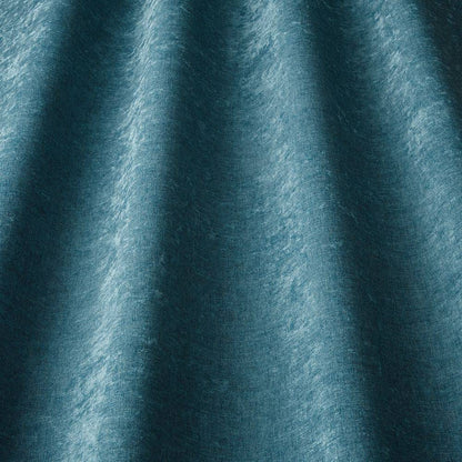 Grosvenor Contract Chenille Kingfisher fabric draped to show sheen and texture, perfect for stylish and stain-resistant upholstery projects.
