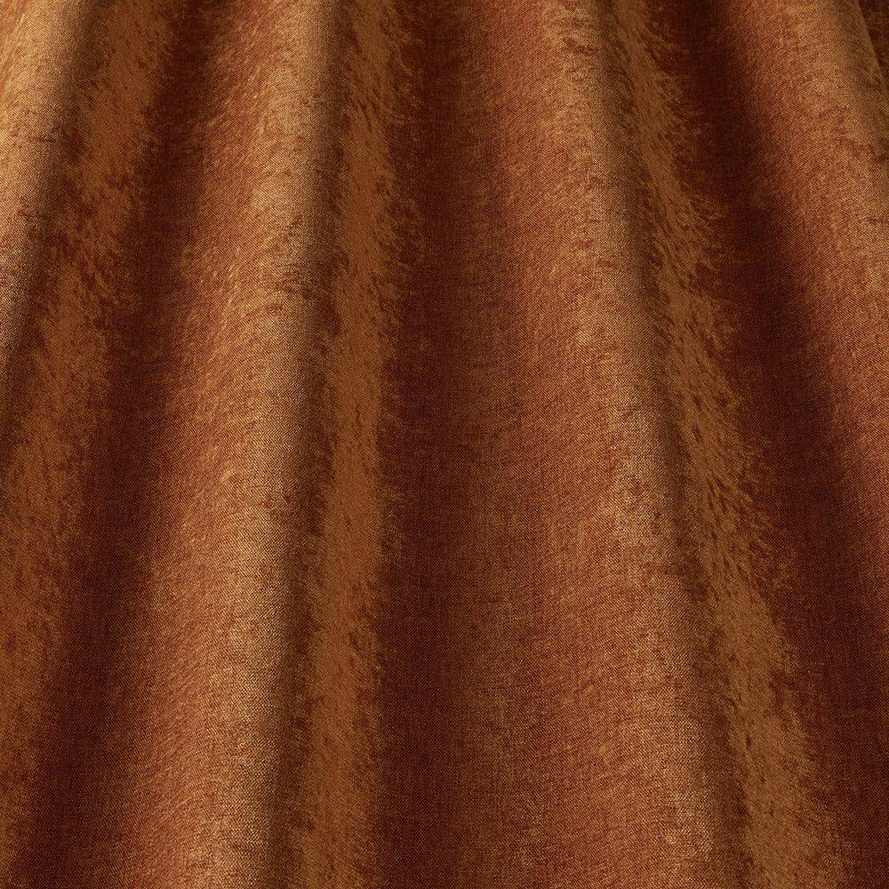 Grosvenor Contract Chenille Rust fabric showcases a rich rust tone with a soft textured finish, ideal for durable upholstery in high-traffic areas.
