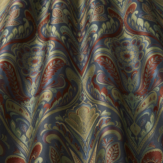 Lawrence Jewel woven damask fabric with intricate arts and crafts floral design in blue, red, and gold tones, ideal for curtains.