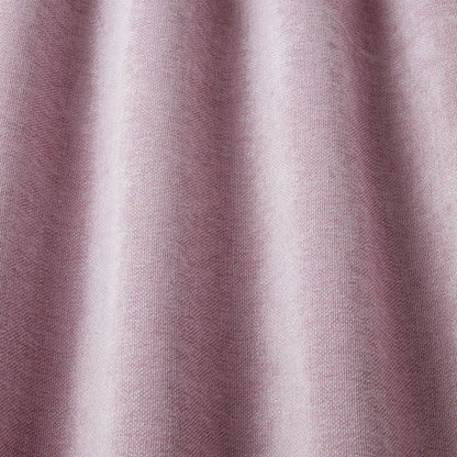 Close-up of Looma Sustainable Woven Candy eco fabric draped to show texture and sheen, perfect for sustainable curtain and upholstery use.